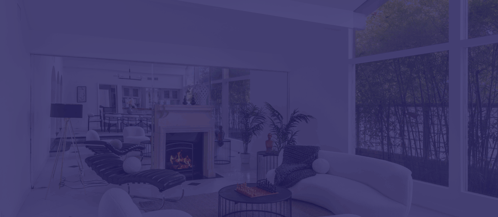 An assorted of comfy couches around a fireplace and coffee table